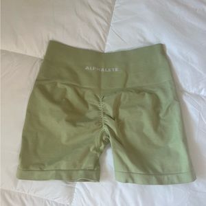 alphalete amplify spring green shorts